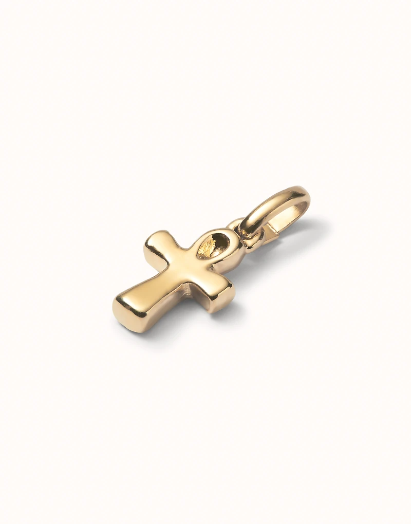 Cross-shaped charm