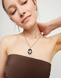 Long necklace with large gray oval faceted crystal