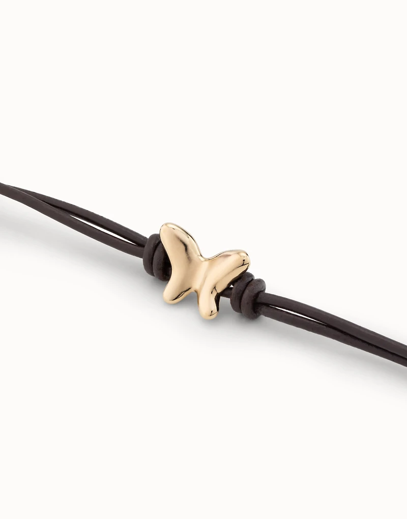Double strand leather bracelet with a butterfly