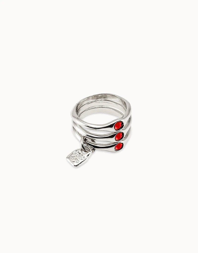 Triple ring with red crystals