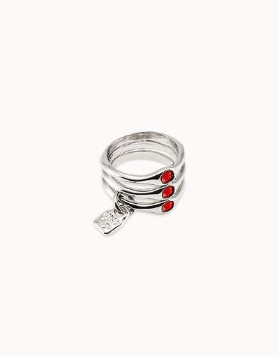 Triple ring with red crystals