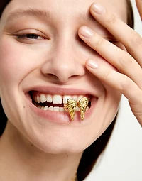 Ring with wing design