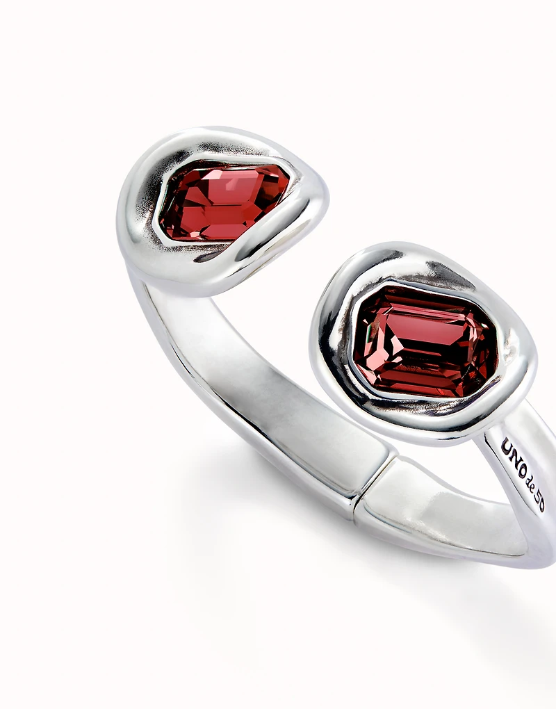 Bangle bracelet with two red crystals