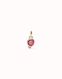 Charm with red stone