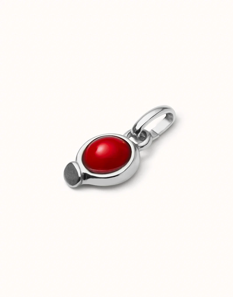 Charm with red stone