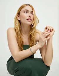 Two-strand beaded bracelet with an eye-shaped charm