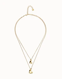 Multi strand chain necklace with two hearts