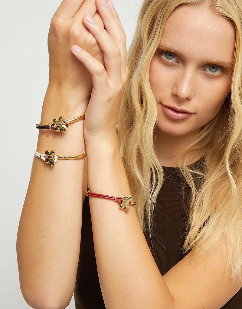 Cream leather bracelet with butterfly ornament