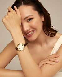 18K gold-plated watch with black leather strap and round white dial