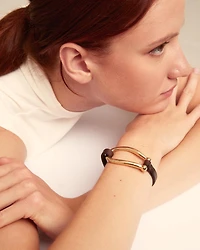 Leather bracelet with large central link