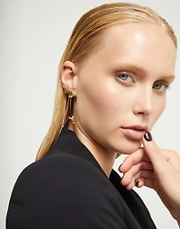 Drop earrings with leather and chained hearts