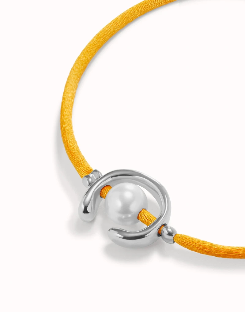 Orange cord bracelet with a pearl
