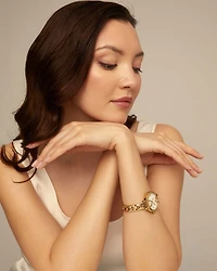 18K gold-plated watch with metal strap and round white dial