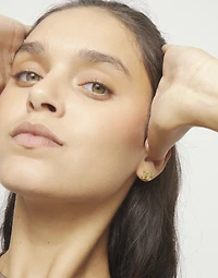 Stud earrings with a butterfly shape