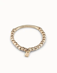 Beaded stretch bracelet with tubular piece