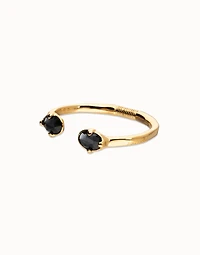 Bangle bracelet with two faceted black oval crystals