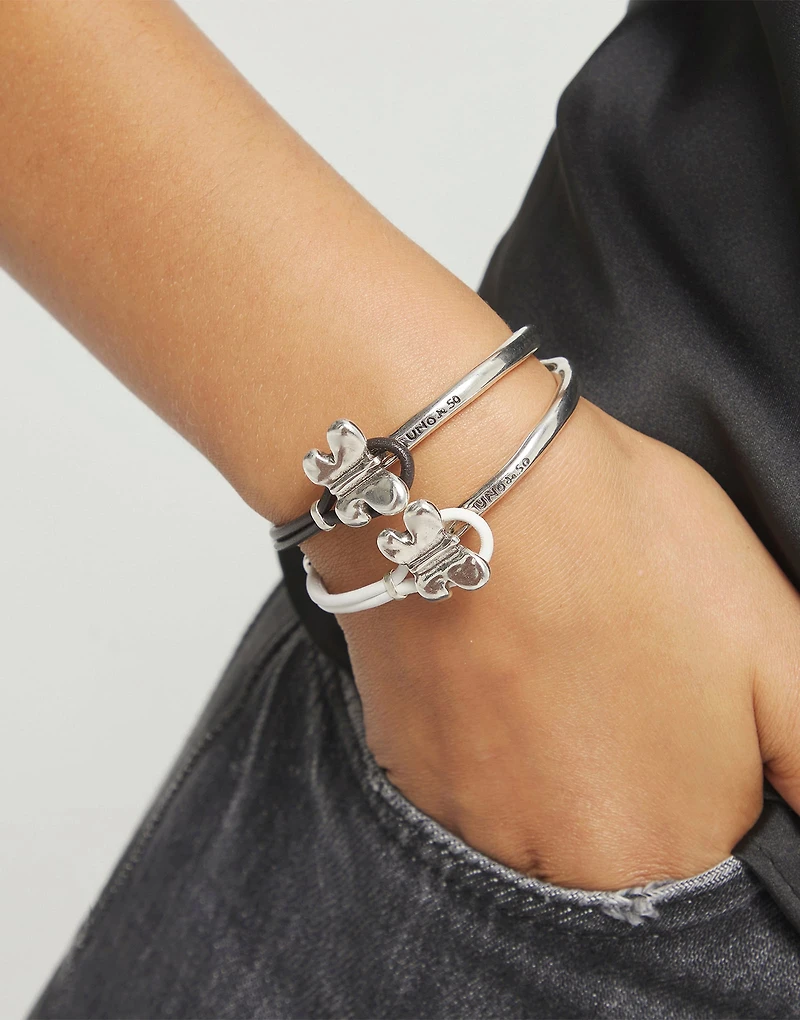 White leather bracelet with butterfly ornament