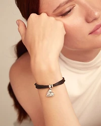 Leather bracelet with a heart charm