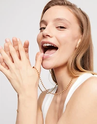 Long beaded chain charm necklace