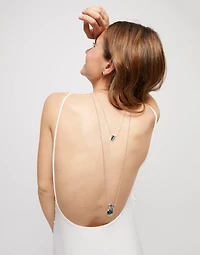 Multi strand chain necklace with green crystals