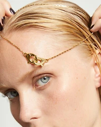 Necklace with interlaced carabiner detail