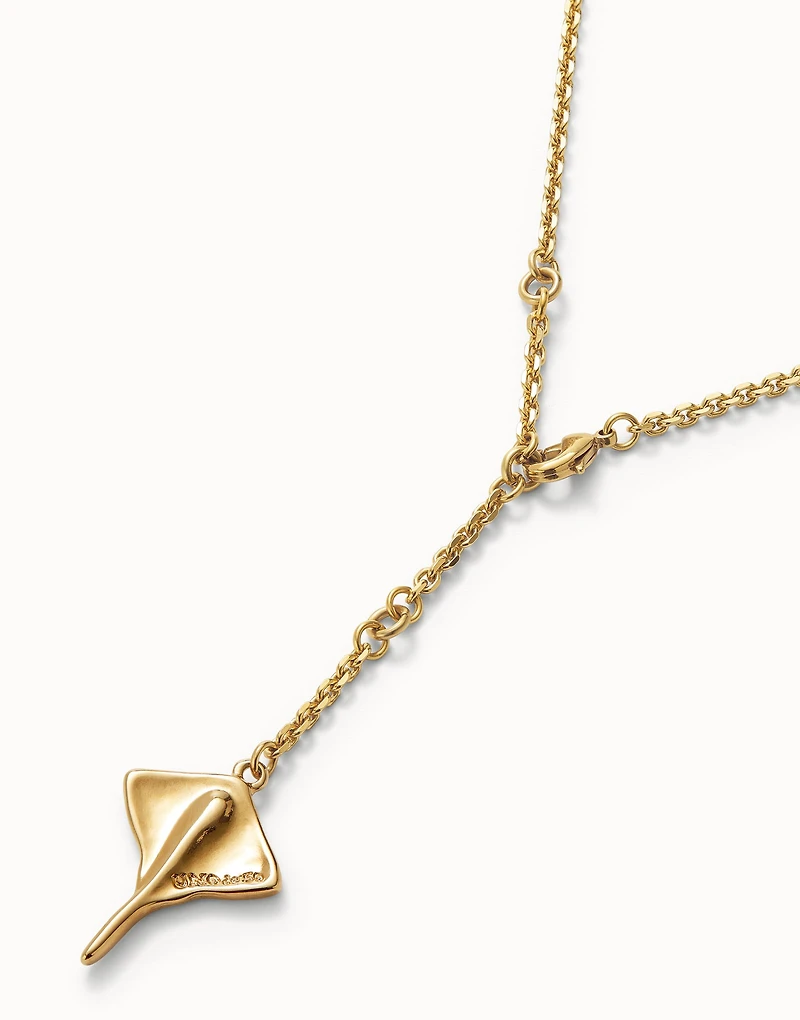 Long chain pendant necklace with manta ray