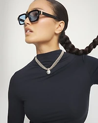 Short necklace with silver threads and large sphere