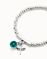 Beaded stretch bracelet with a murano glass and a dragonly
