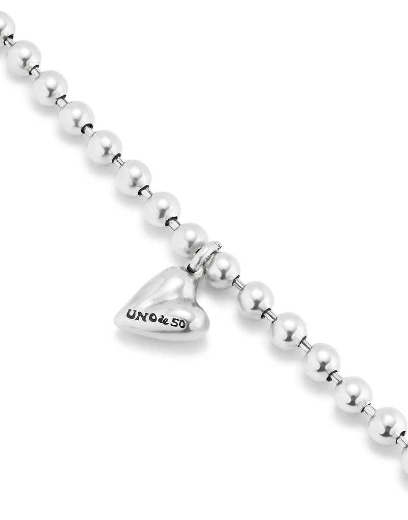 Beaded bracelet with a heart charm