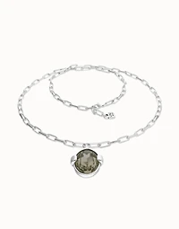 Long necklace with large gray oval faceted crystal