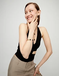 Bangle bracelet with two faceted black oval crystals