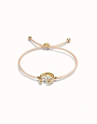 Salmon cord bracelet with a pearl