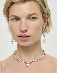 Long earrings with starfish and pearl
