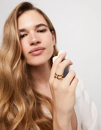 Double ring with white topaz