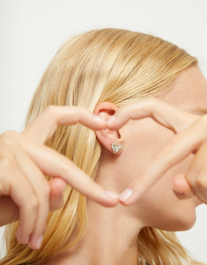 Heart piercing stud earrings