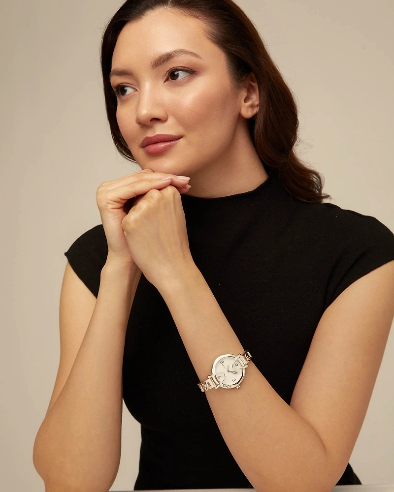 Sterling silver-plated watch with metal strap and round white dial