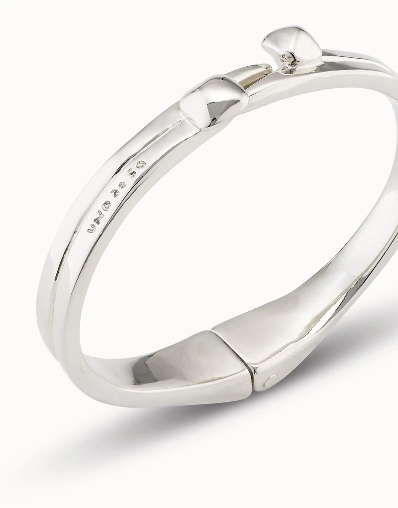 Sterling silver-plated nail shaped bracelet with hidden spring