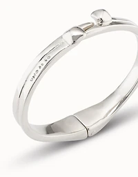 Sterling silver-plated nail shaped bracelet with hidden spring