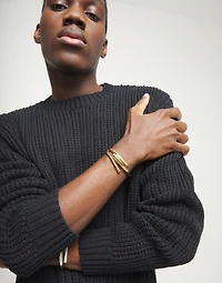 Bangle bracelet with three intertwined organic shapes