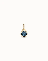 Circular charm with crystal