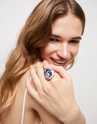 Ring with purple crystal