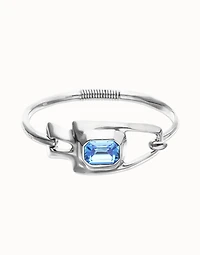 Semi-rigid bracelet with blue faceted crystal