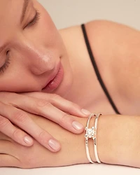 Bangle bracelet with central crystal