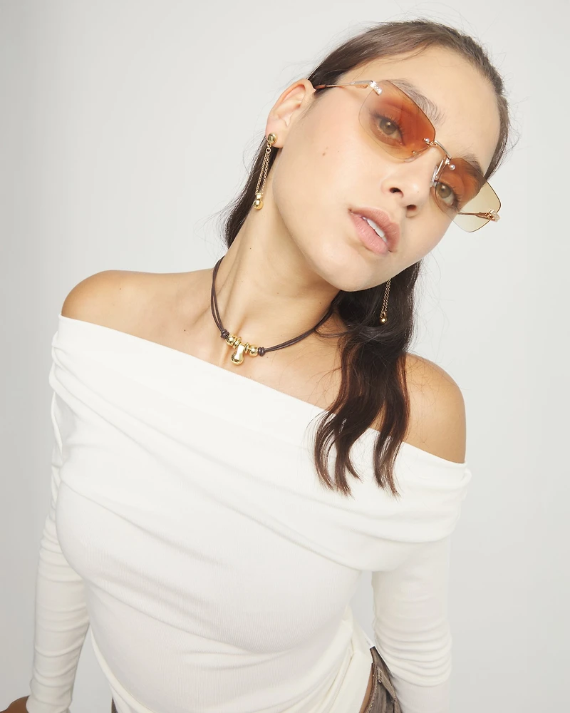 Short leather necklace with three spheres