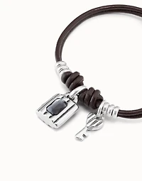 Sterling silver-plated bracelet with leather straps and padlock and key charms