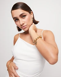 Beaded bracelet with a padlock charm