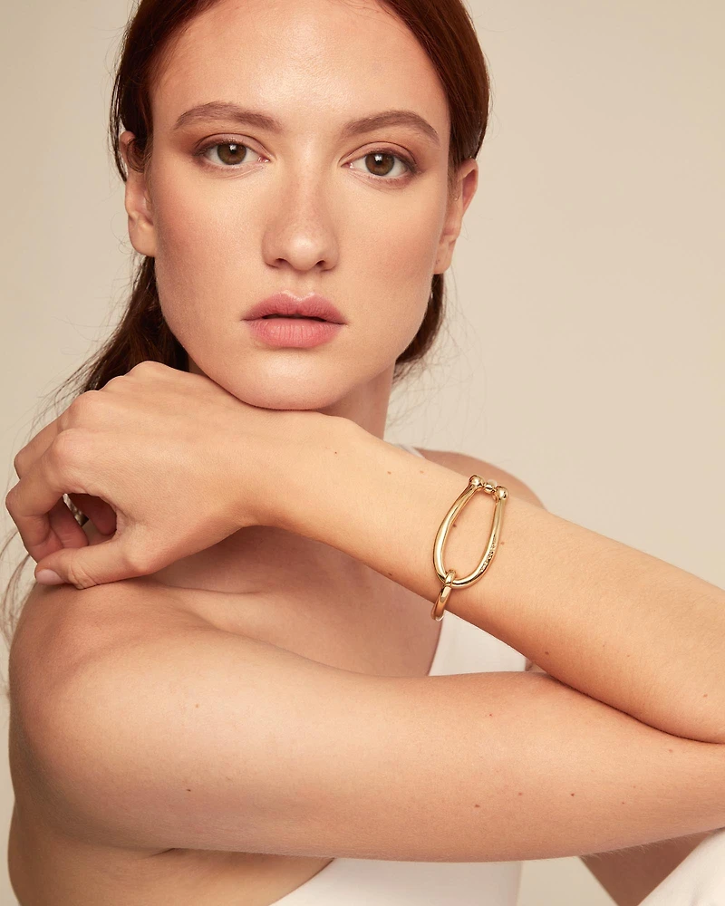 Bangle bracelet with large link