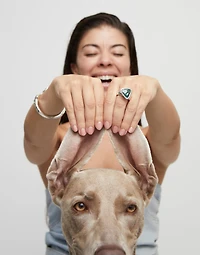 Triangular ring with green crystal