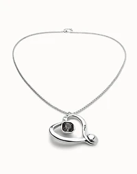 Long chain pendant necklace with a large heart