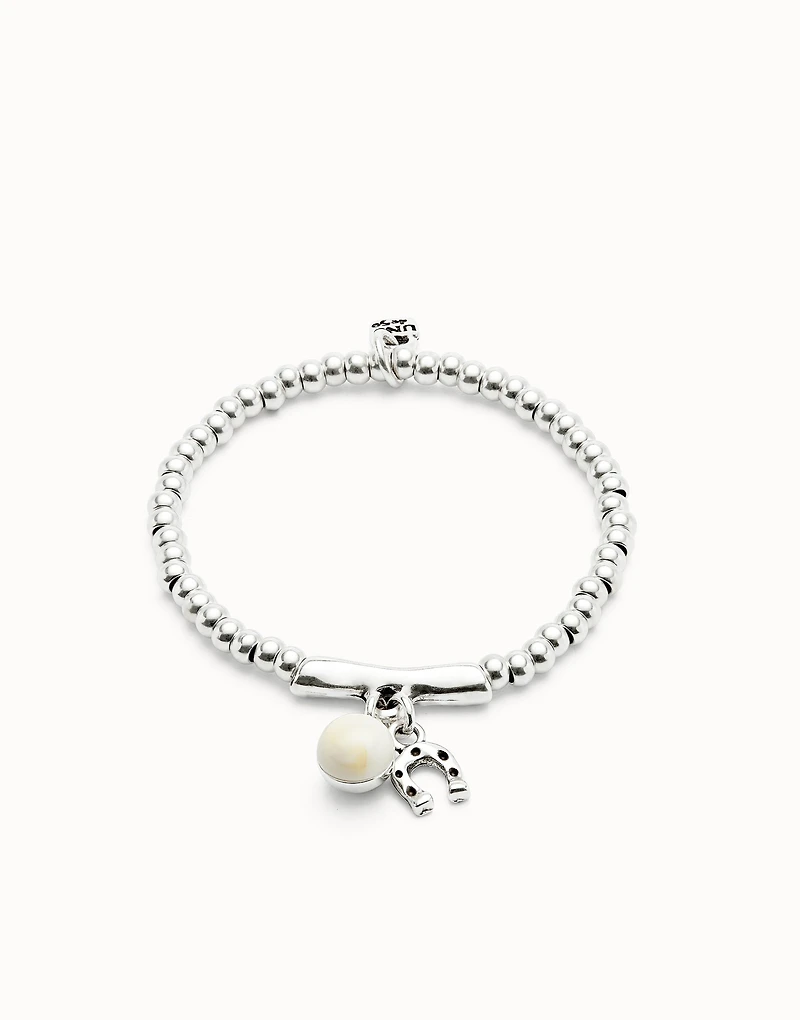 Beaded stretch bracelet with a murano glass and a horseshoe charm